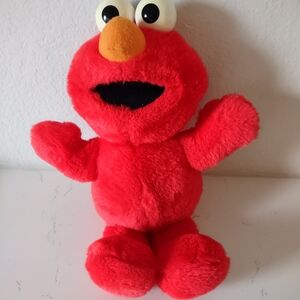 Sesame Street Red Elmo Plush with Orange Nose and Black Mouth